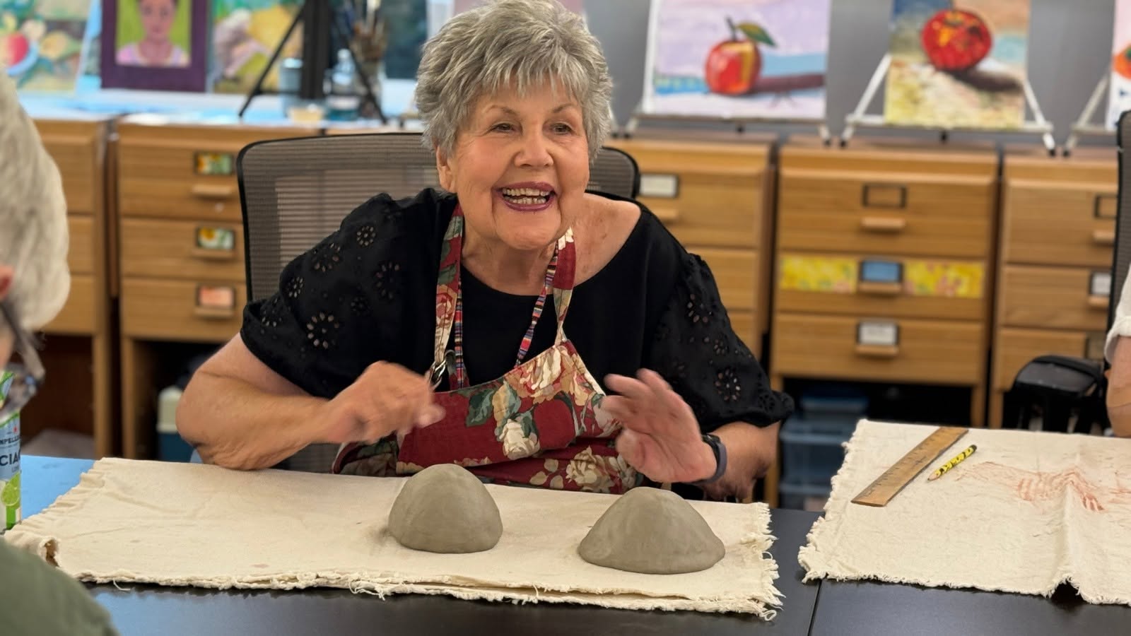 Resident enjoying a pottery class