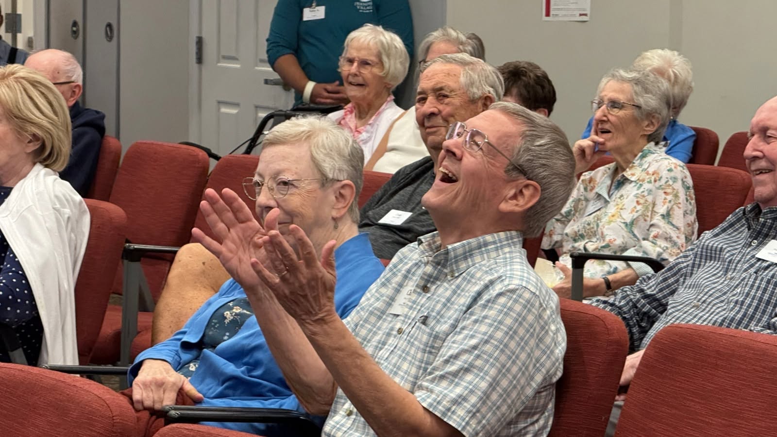 Residents laughing together at an event